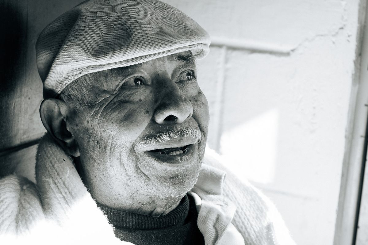 Portrait of my grandfather as he was sitting by the door to the yard to get his legs warmed up in the sun.