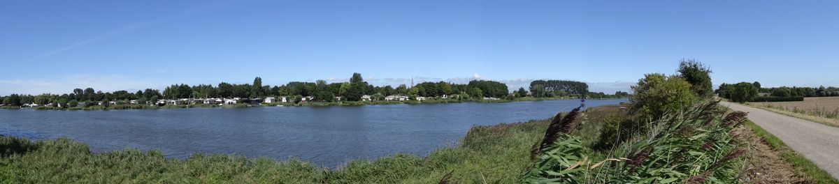 Panorama foto van De Vogel Hengstdijk met de camping op de achtergrond